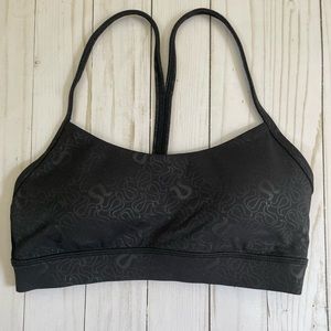 Lululemon flow y bra in Yogo Emboss Black excellent condition size 4
